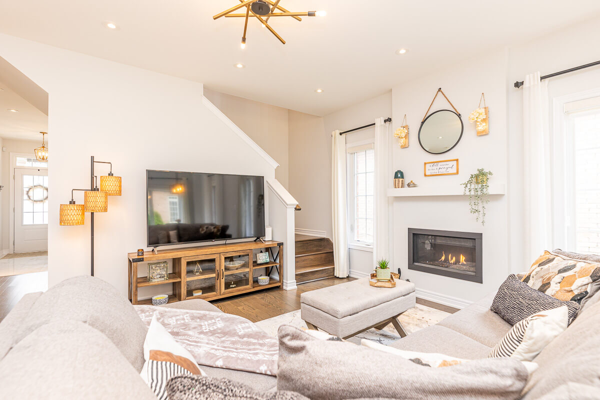 living room with tv fireplace and modern decor Toronto real estate photography