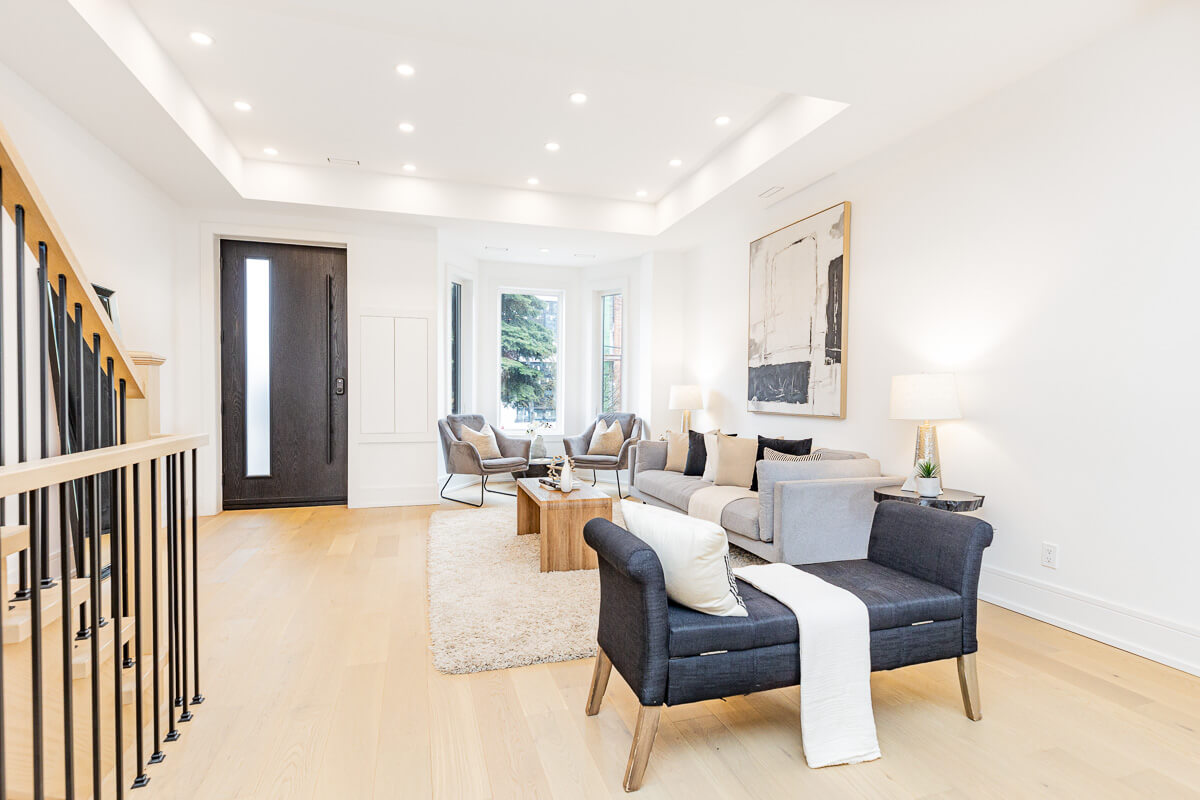 Bright living room with natural light and modern decor, professional real estate photography Toronto