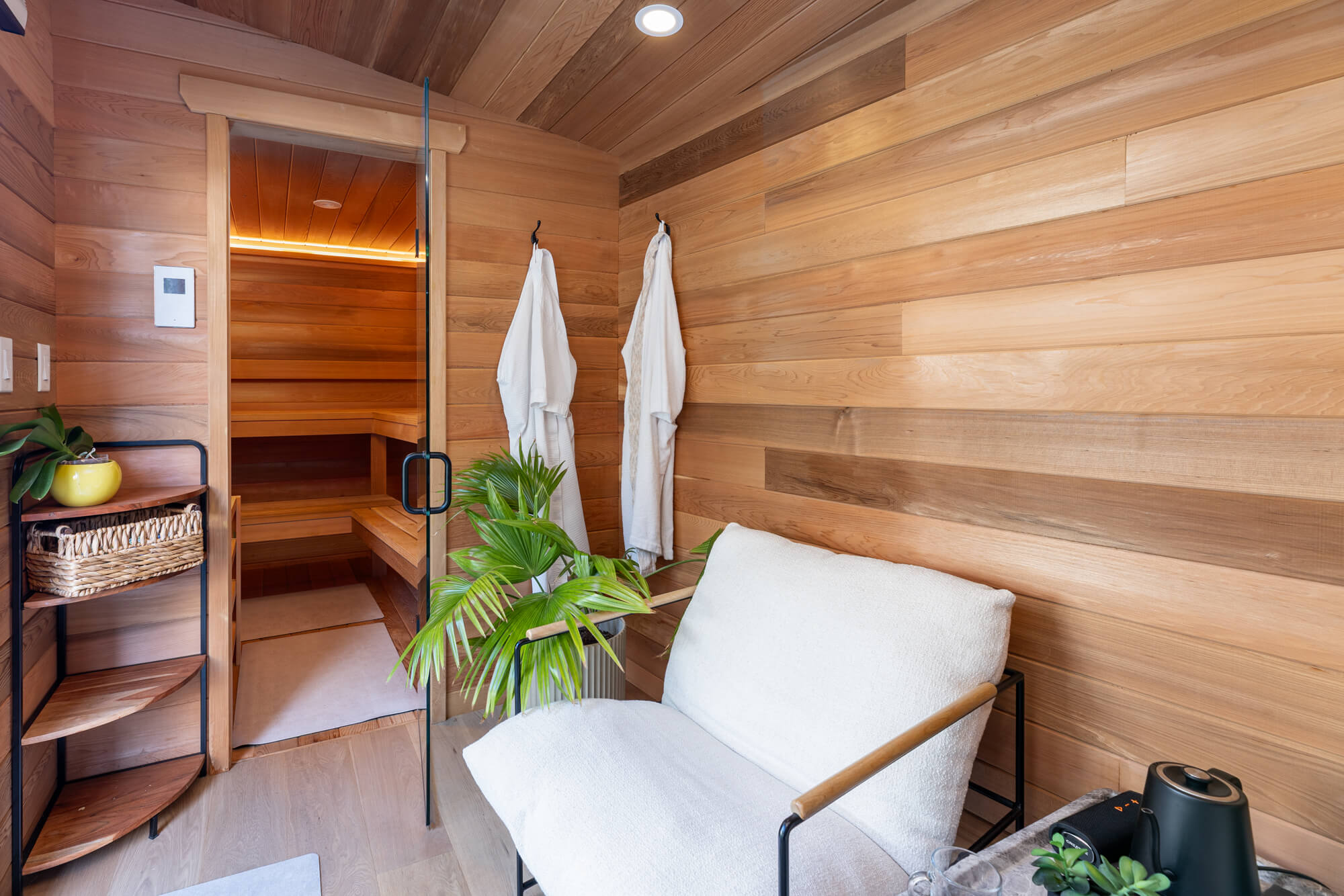 Airbnb cottage sauna interior with natural wood finish and relaxing spa-style atmosphere