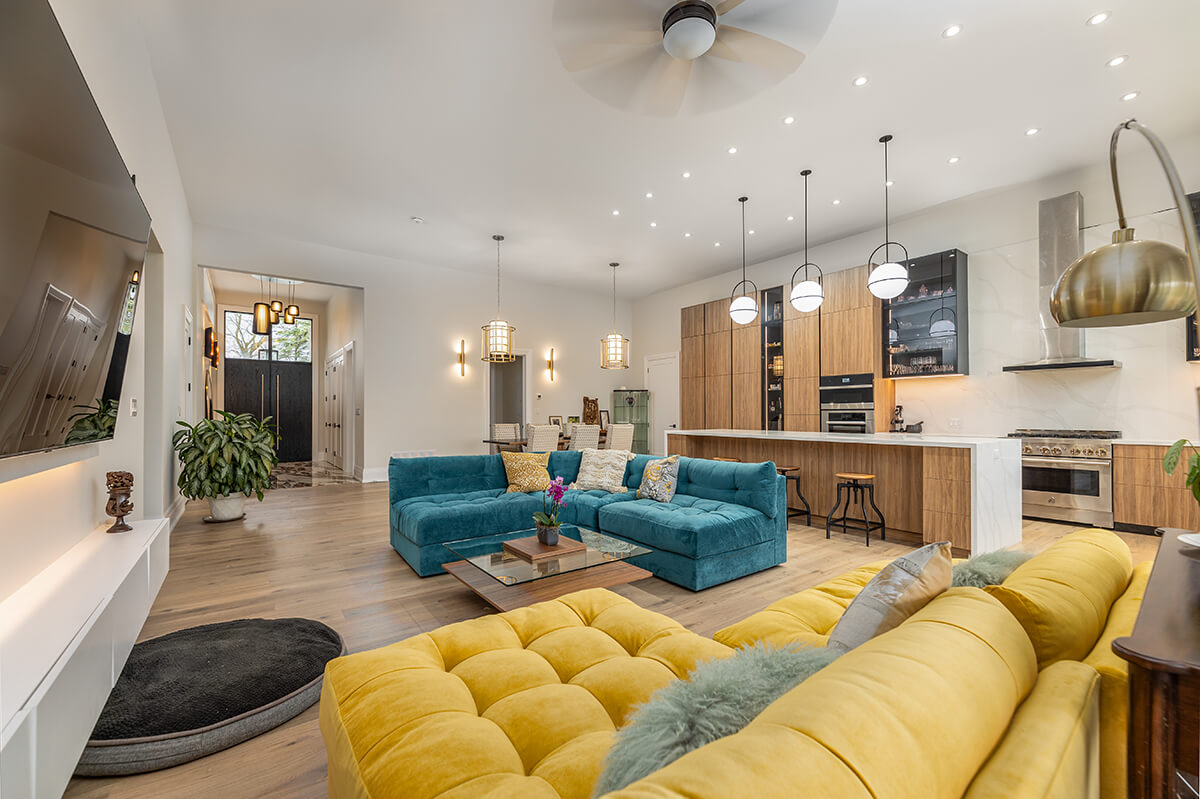 Toronto Airbnb photography showing open concept living room and kitchen with modern furniture and bright natural light