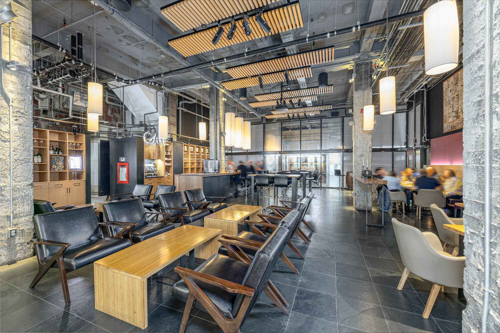 Café and bar photography in Toronto showing interior design, bar counter and customer seating