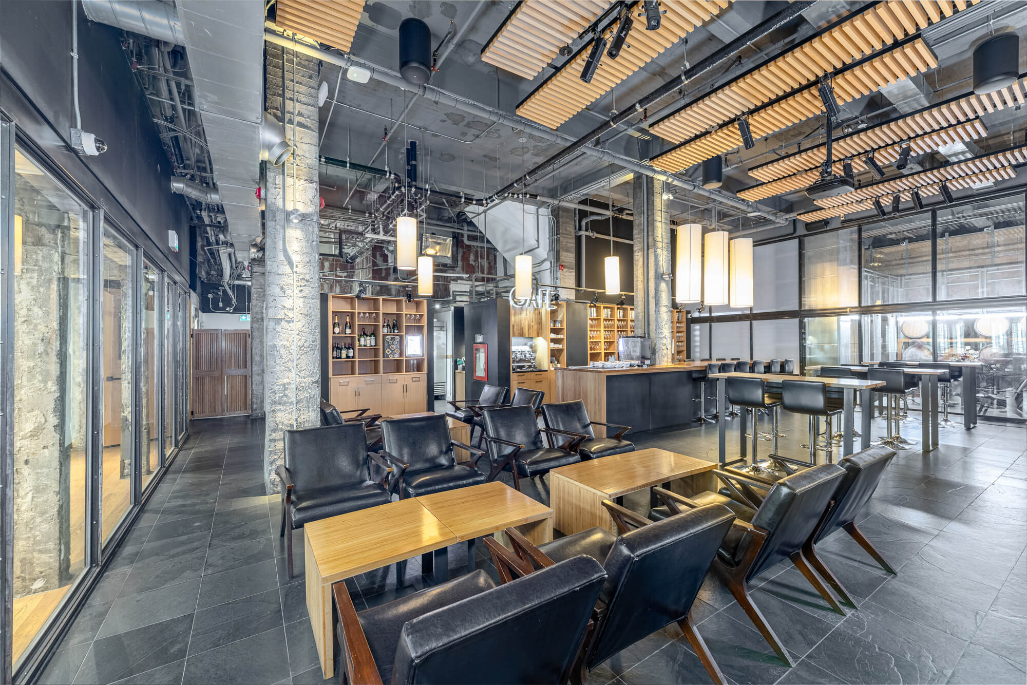 Commercial interior photography in Toronto showing stylish café lounge seating and branded atmosphere